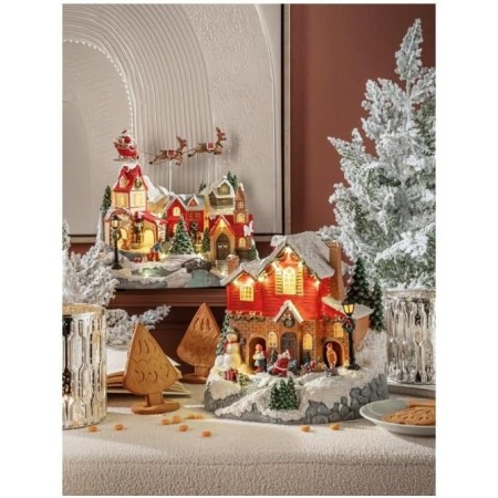 Villaggio con renne volanti ” Arrivano i doni” con led, movimento e musica- alimentazione 220v 30 x 19 x 28 h cm